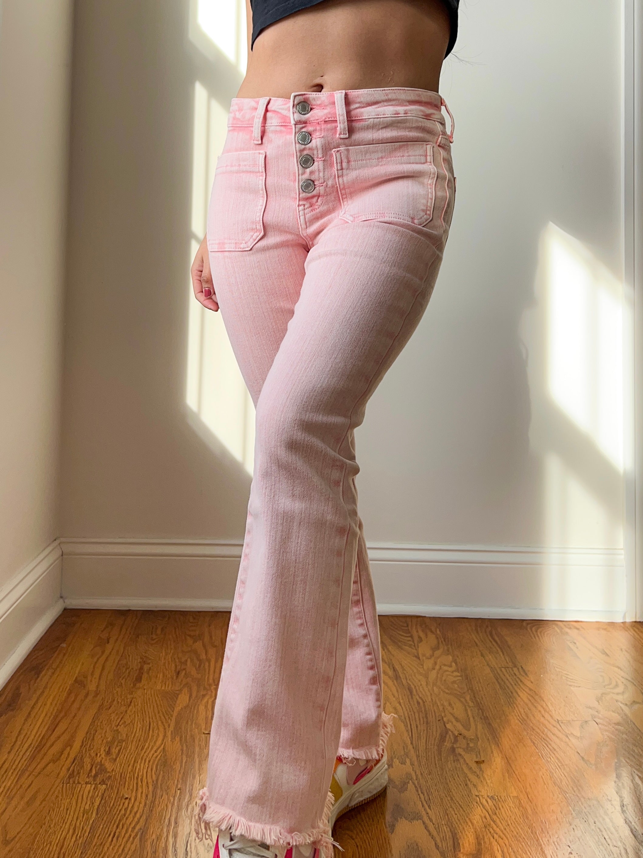 Pieces Petite Peggy flared jeans in pink